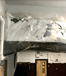 Damaged lead paint on ductwork in gym — “control” used is plastic wrap?